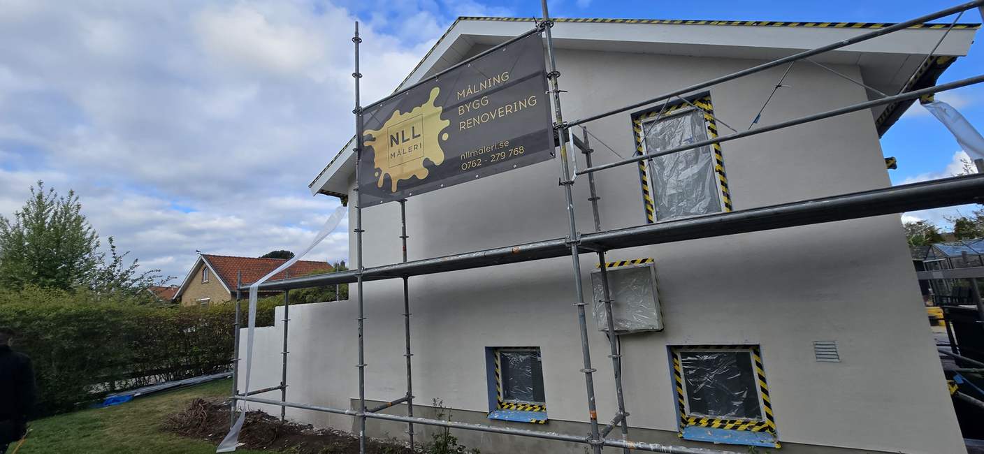 Nymålad putsfasad på villa i Ängelholm