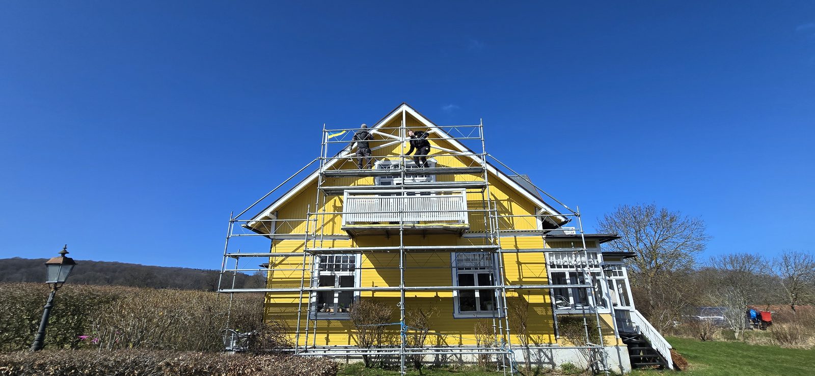 Träfasad målning – NLL Måleri